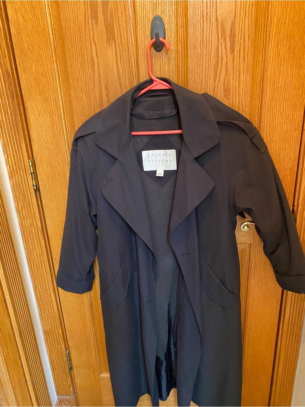 Valerie Stevens Navy-Black Trench Coat with zip out liner
Size tag incorrect